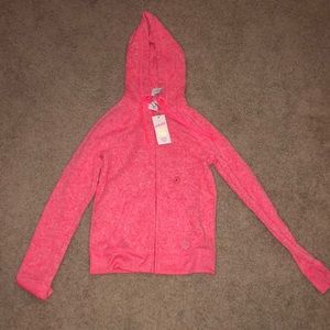 pink zip up sweatshirt